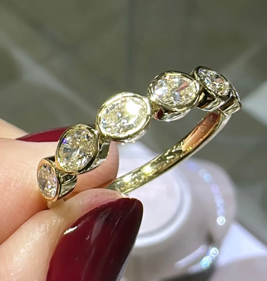 0.97ct tw Oval Cut Diamond Bezel Set Eternity Band