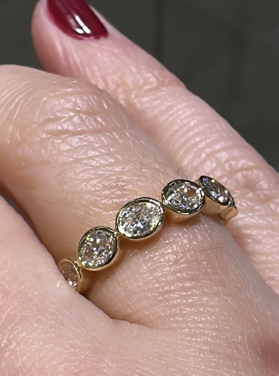 0.97ct tw Oval Cut Diamond Bezel Set Eternity Band