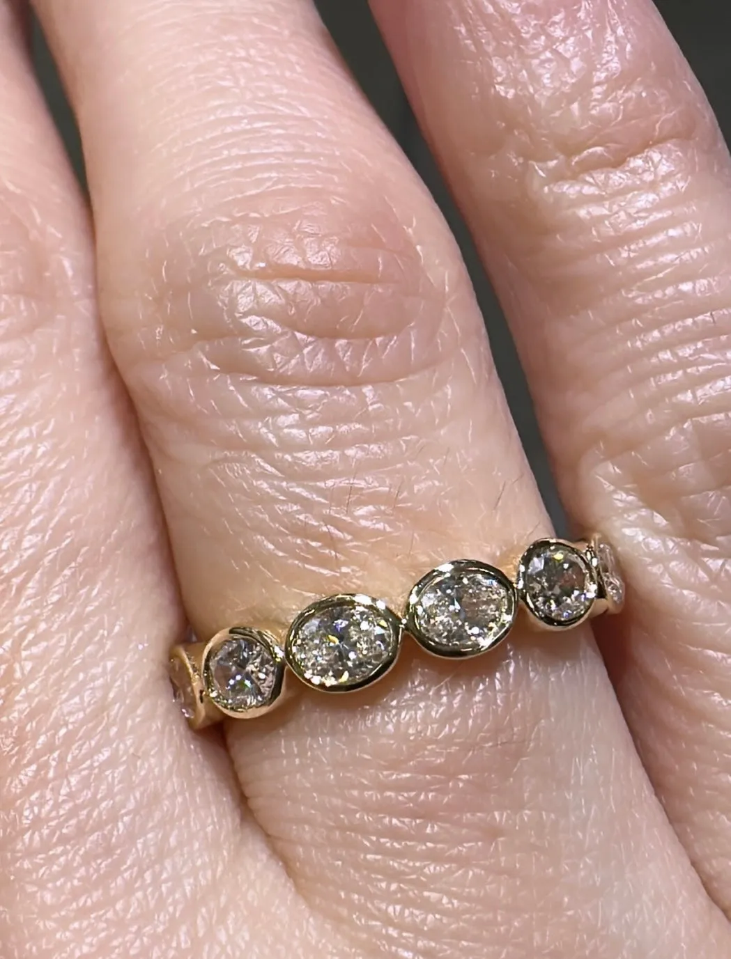 0.97ct tw Oval Cut Diamond Bezel Set Eternity Band