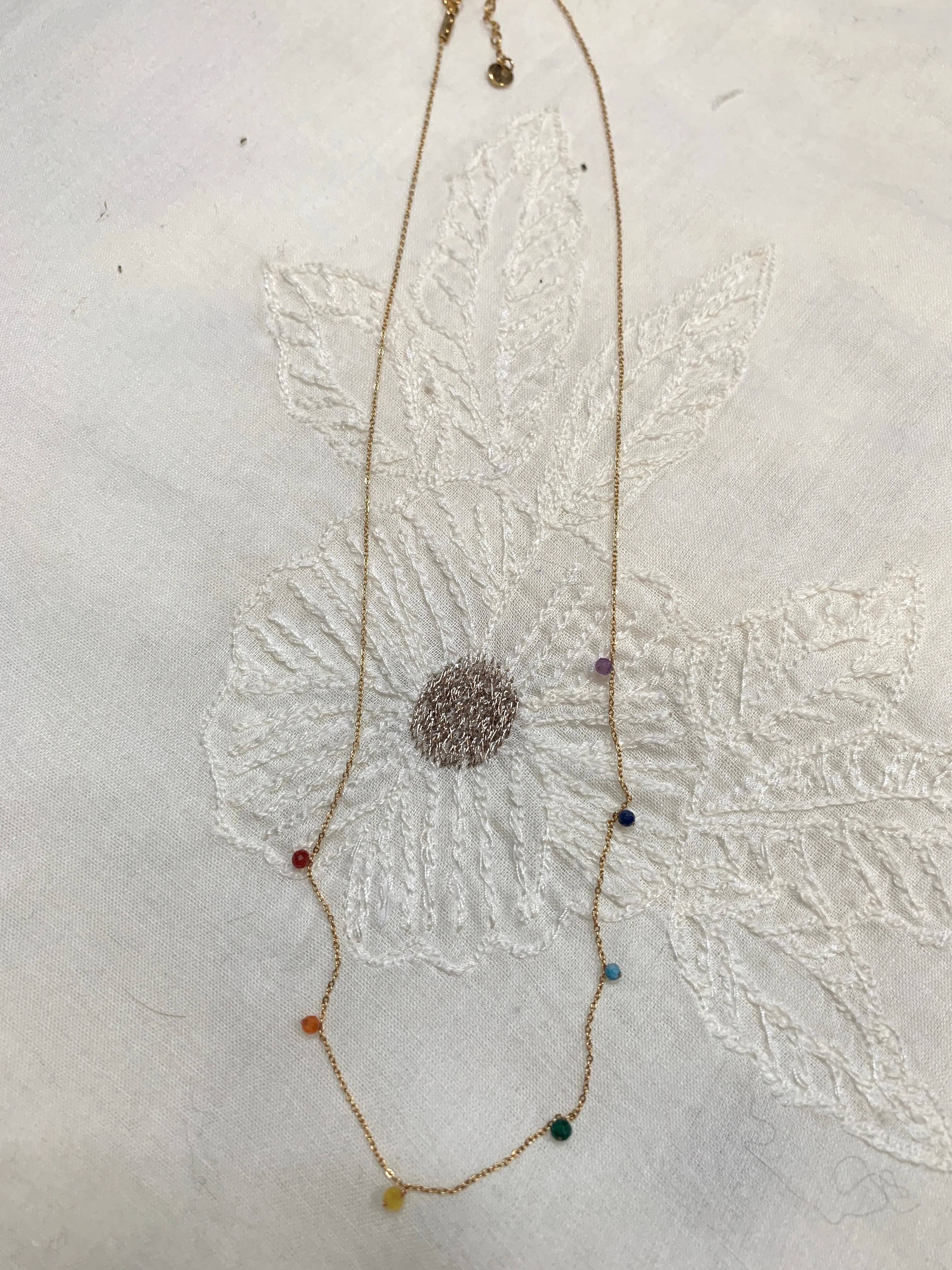 Dainty necklace with 7 chakras crystals