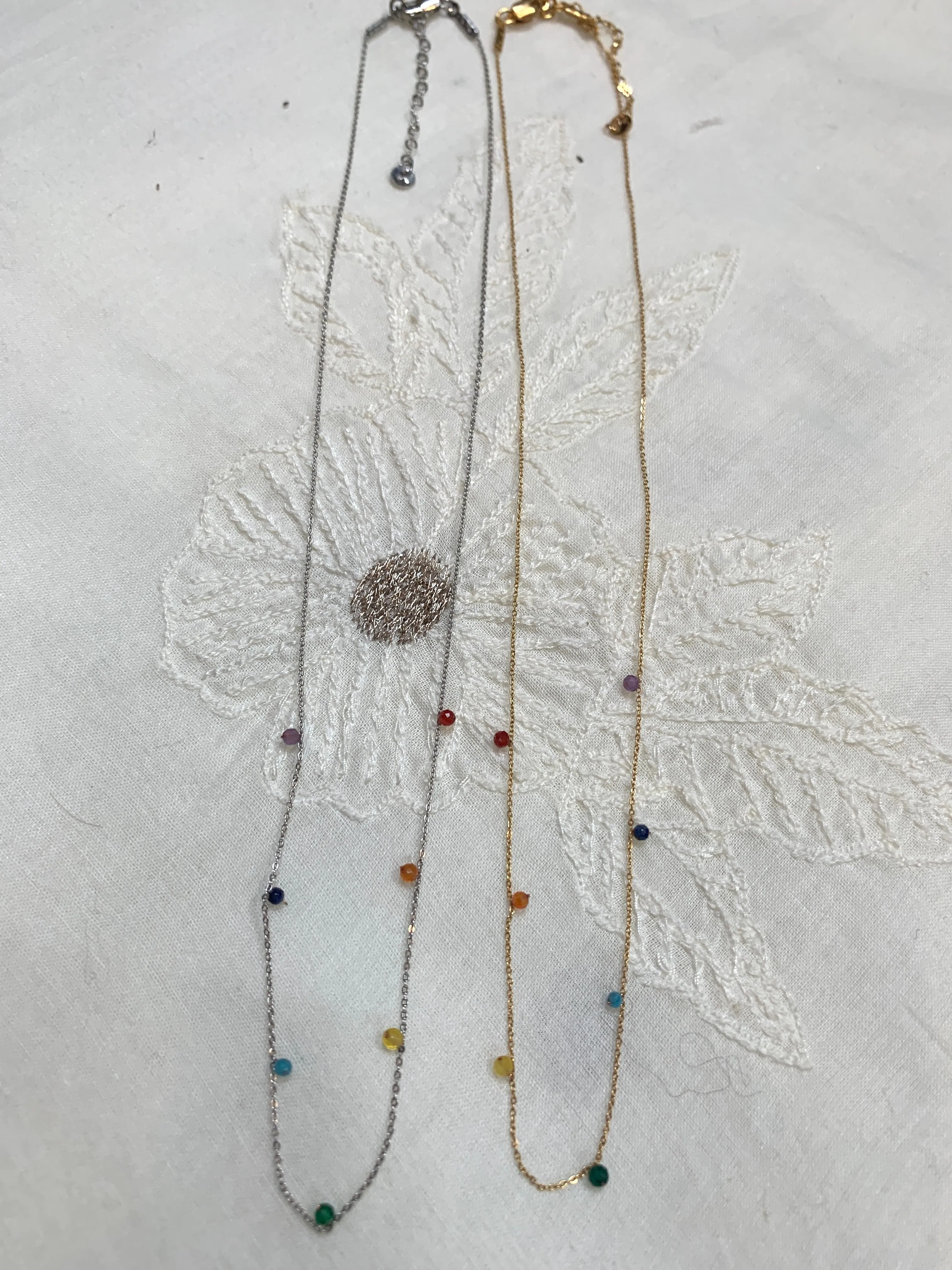 Dainty necklace with 7 chakras crystals
