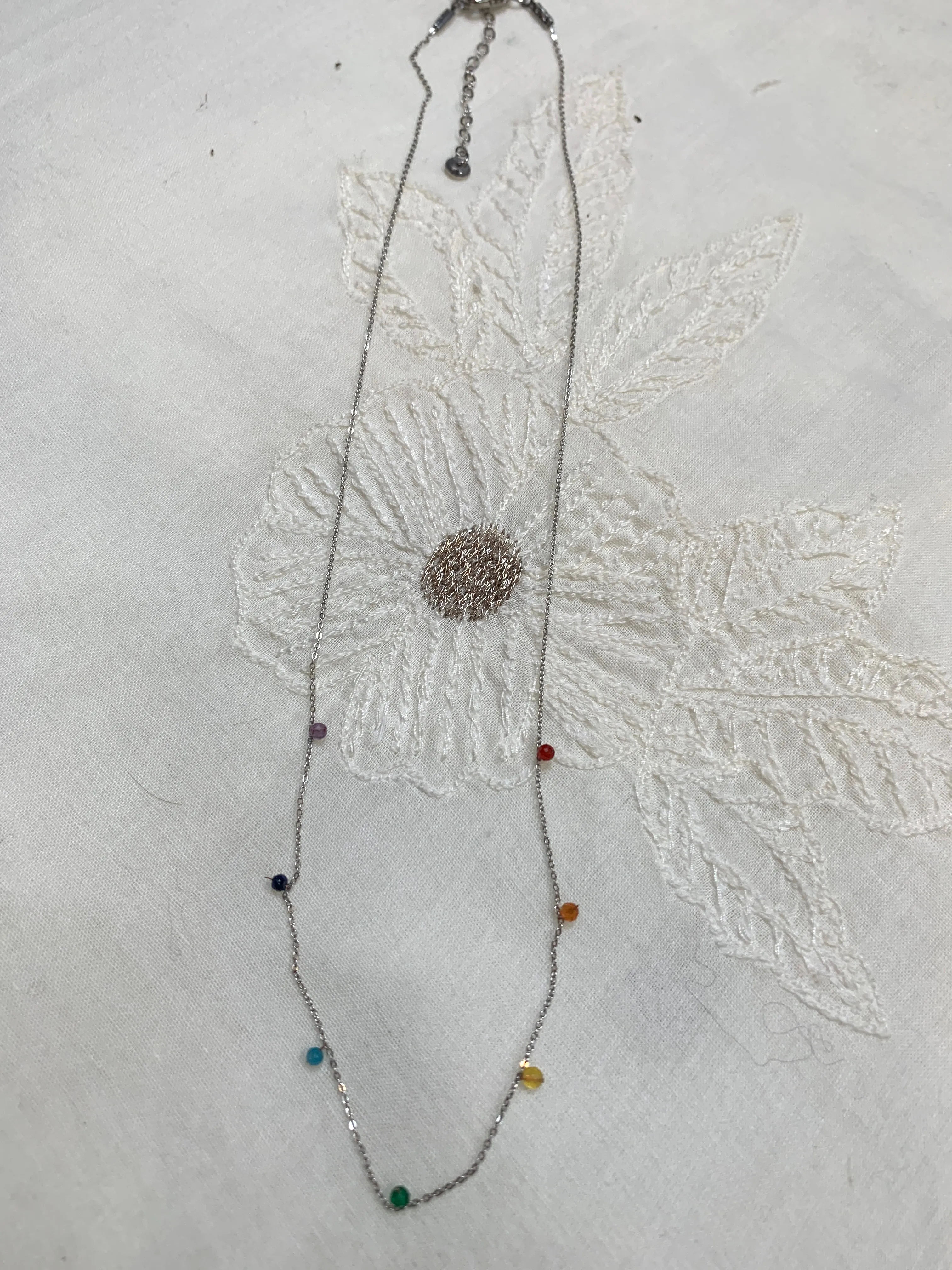 Dainty necklace with 7 chakras crystals