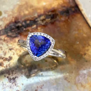 Tantalizing Trilliant Cut Tanzanite With Diamond Halo Ring